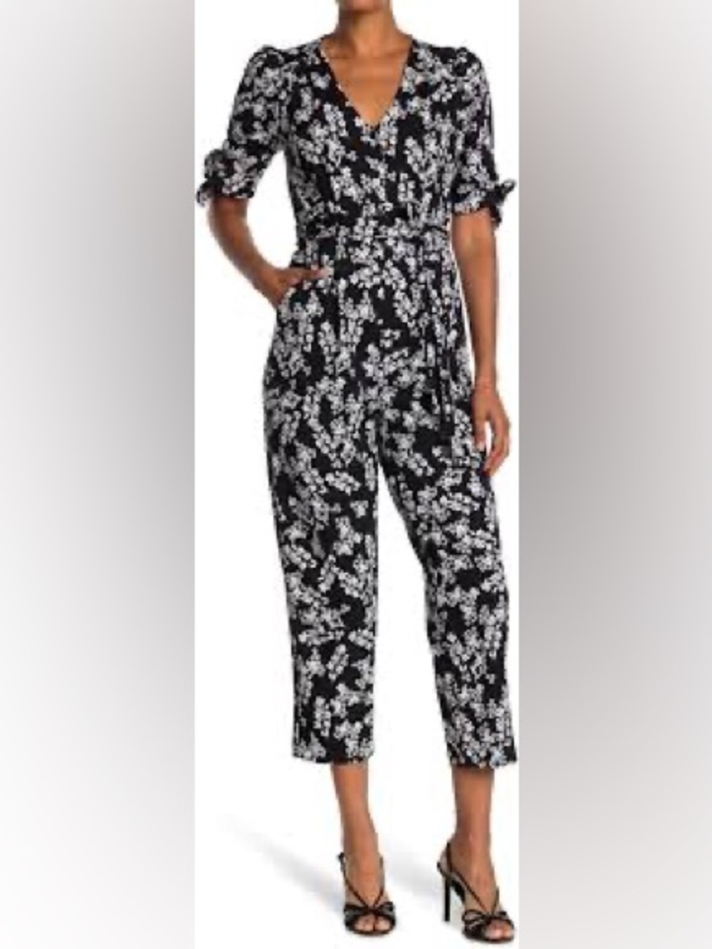 Calvin Klein Black Jumpsuit with White Floral Print – Size 8
